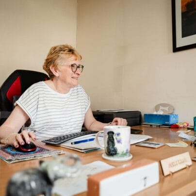 DACCS - Pauline Hilton at her desk